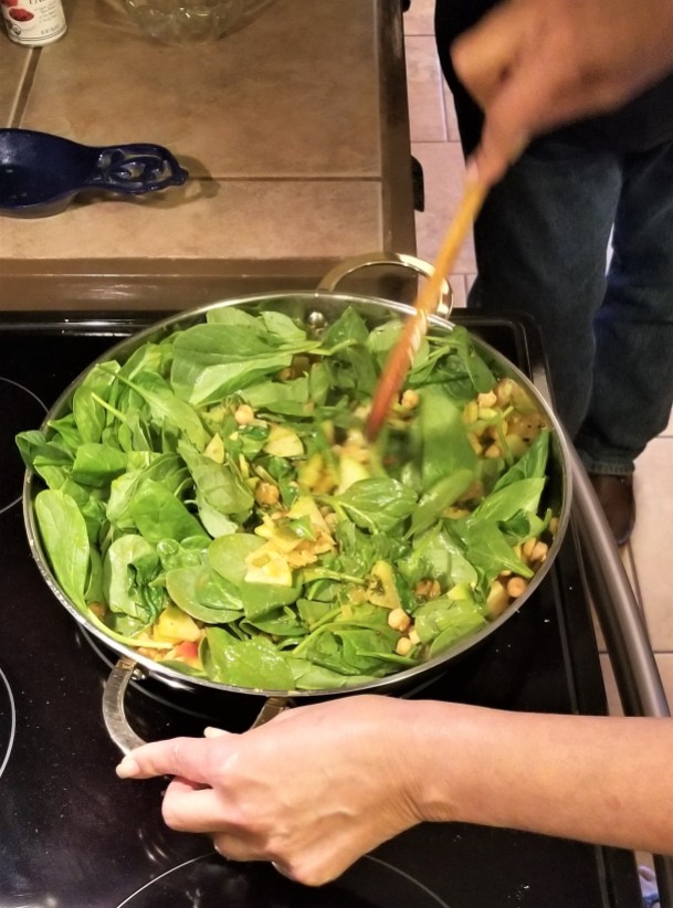 Vegan Curry Adding Spinach
